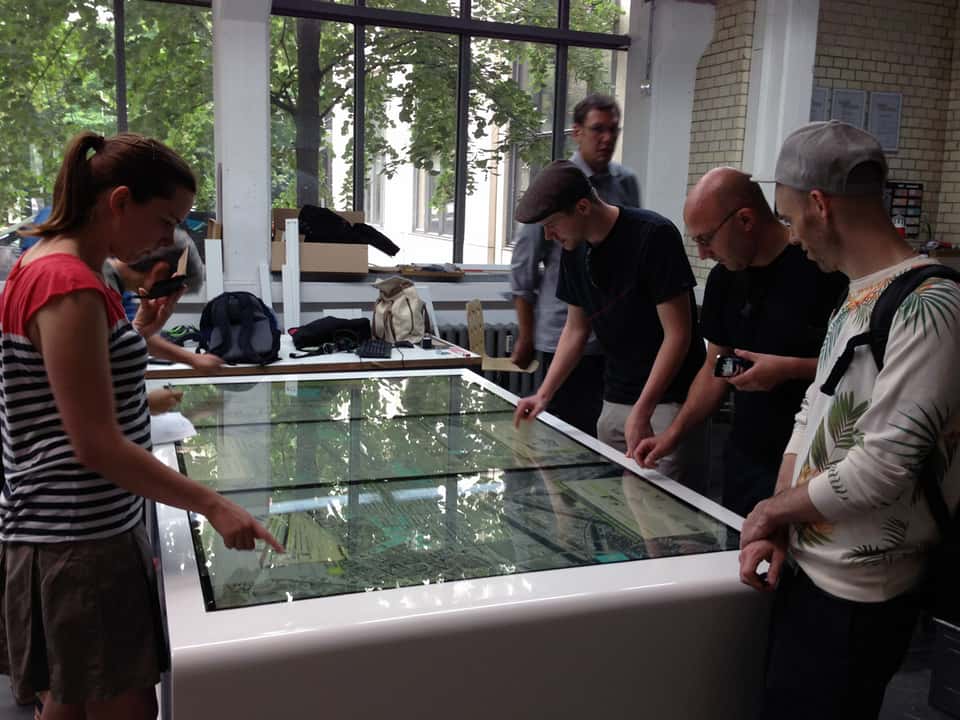 User testing session around the BASF media table prototype during interaction and usability evaluation.